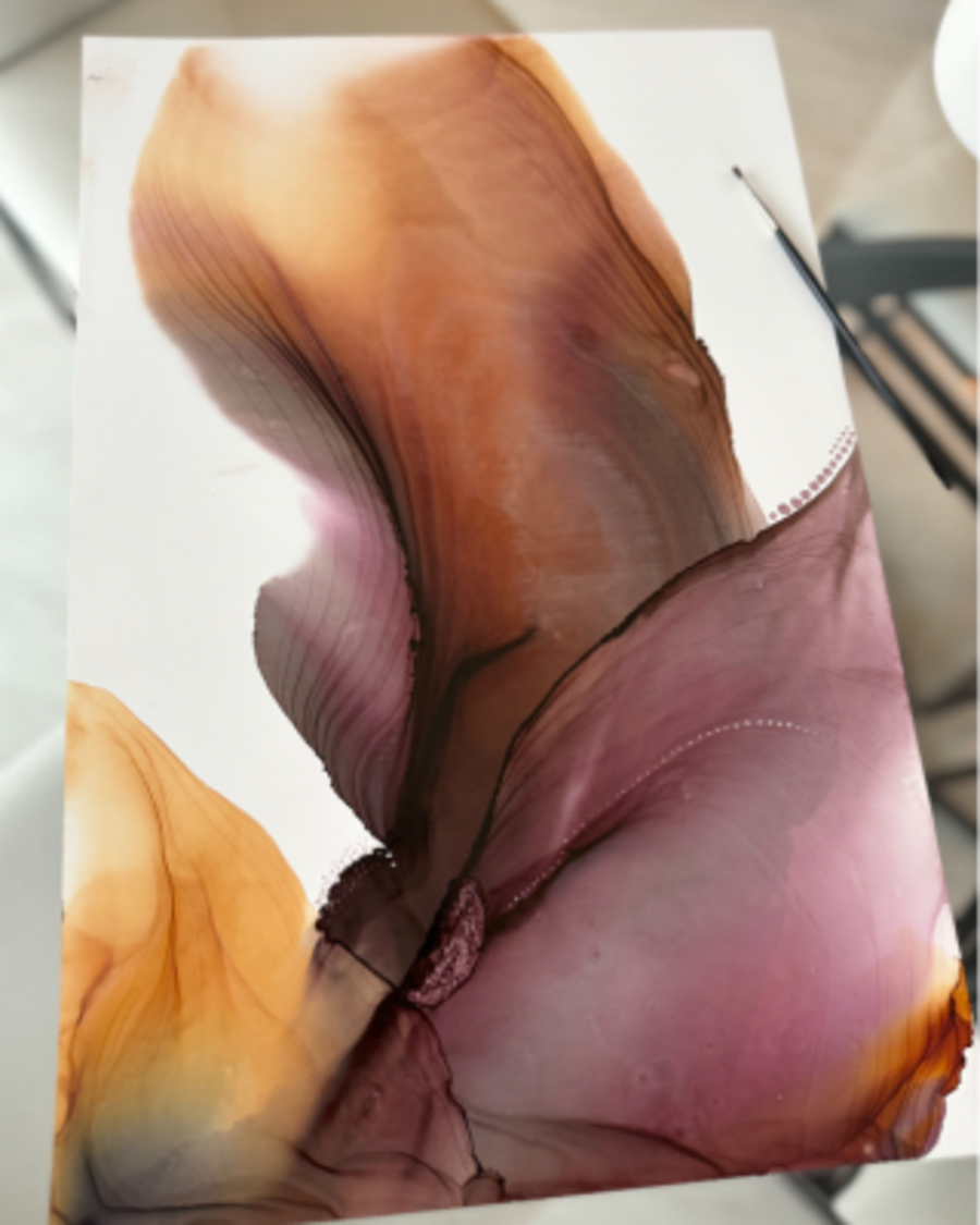Abstract artwork in shades of orange and burgundy