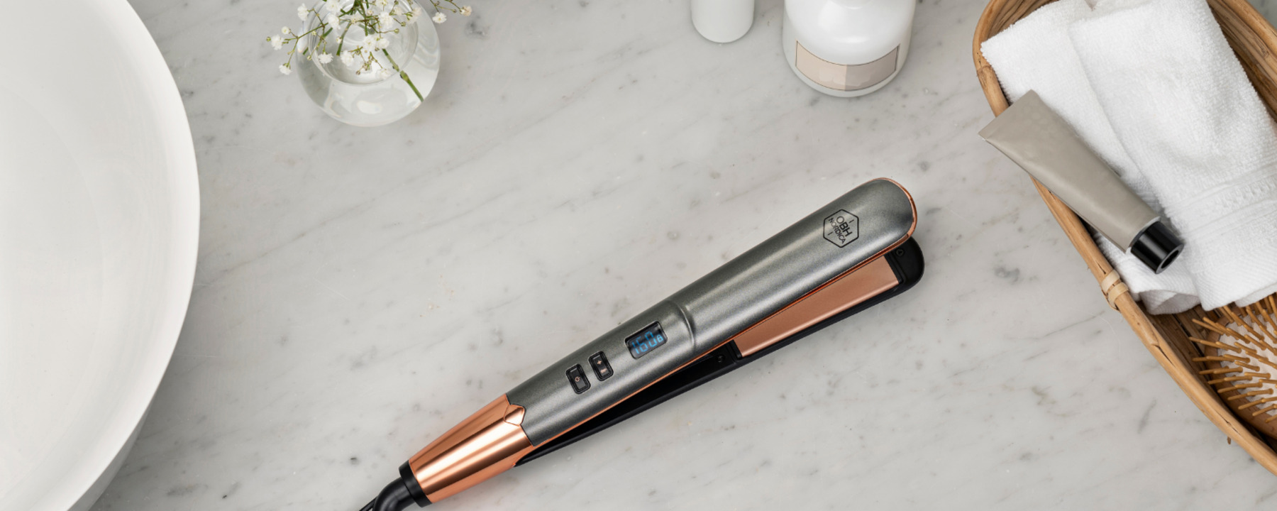 Hair straightener on table