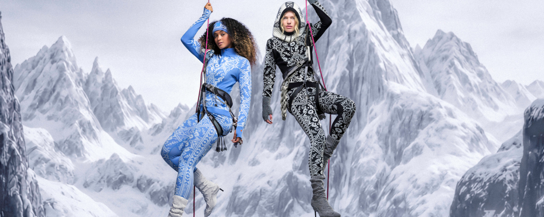 Two women climbing in the mountains wearing Kari Traa baselayers