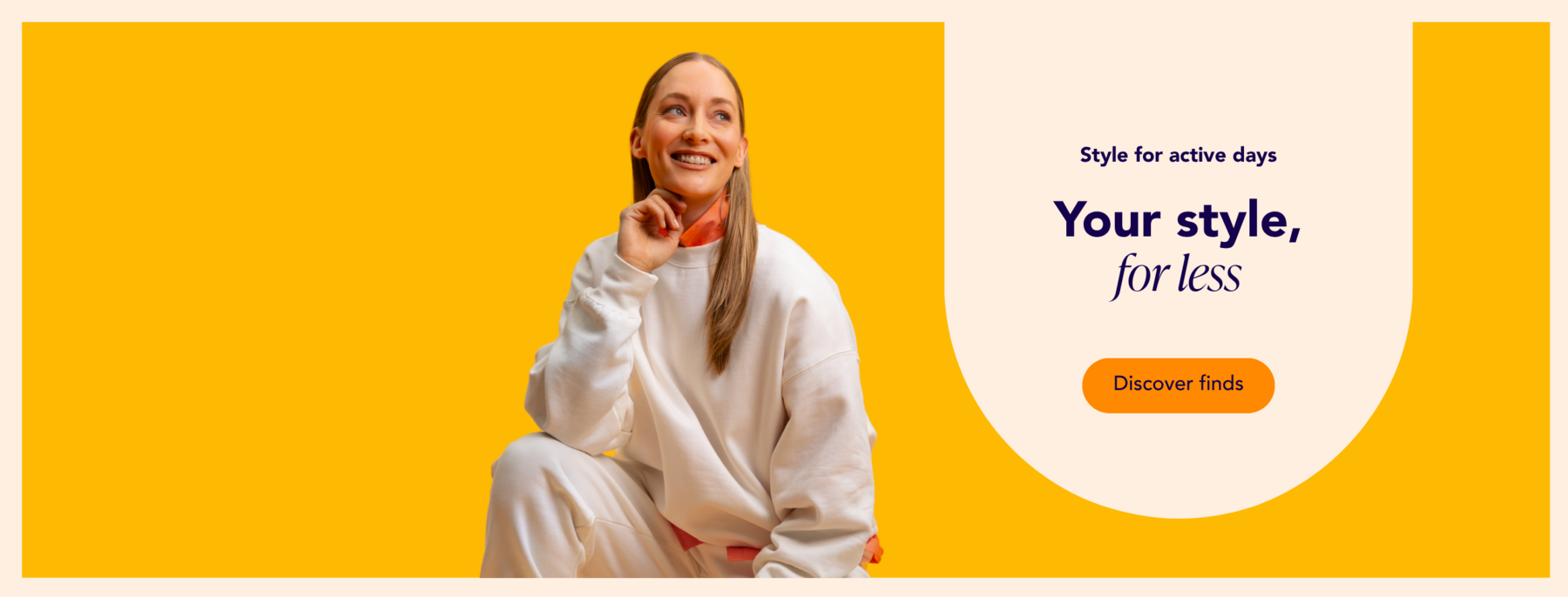 Woman wearing a sweatshirt against an orange background
