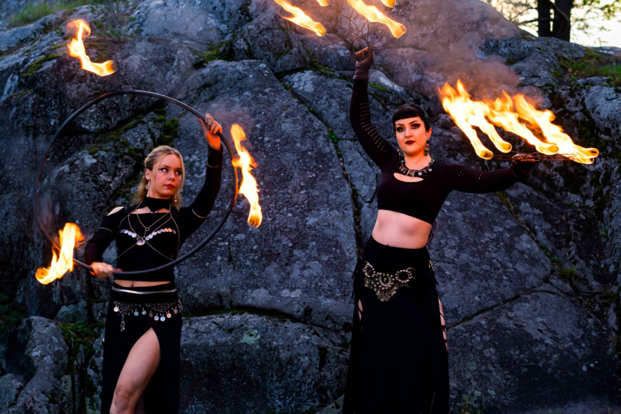 Fire show Two women performing with fire at night