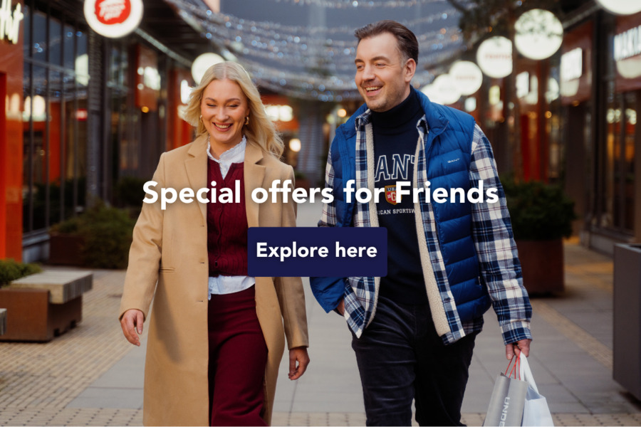 A man and a woman shopping, wearing Gant clothing