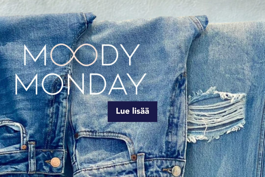 A close up picture of denim jeans hanging on a rack. Text on picture reads: "Moody Monday- Read More"