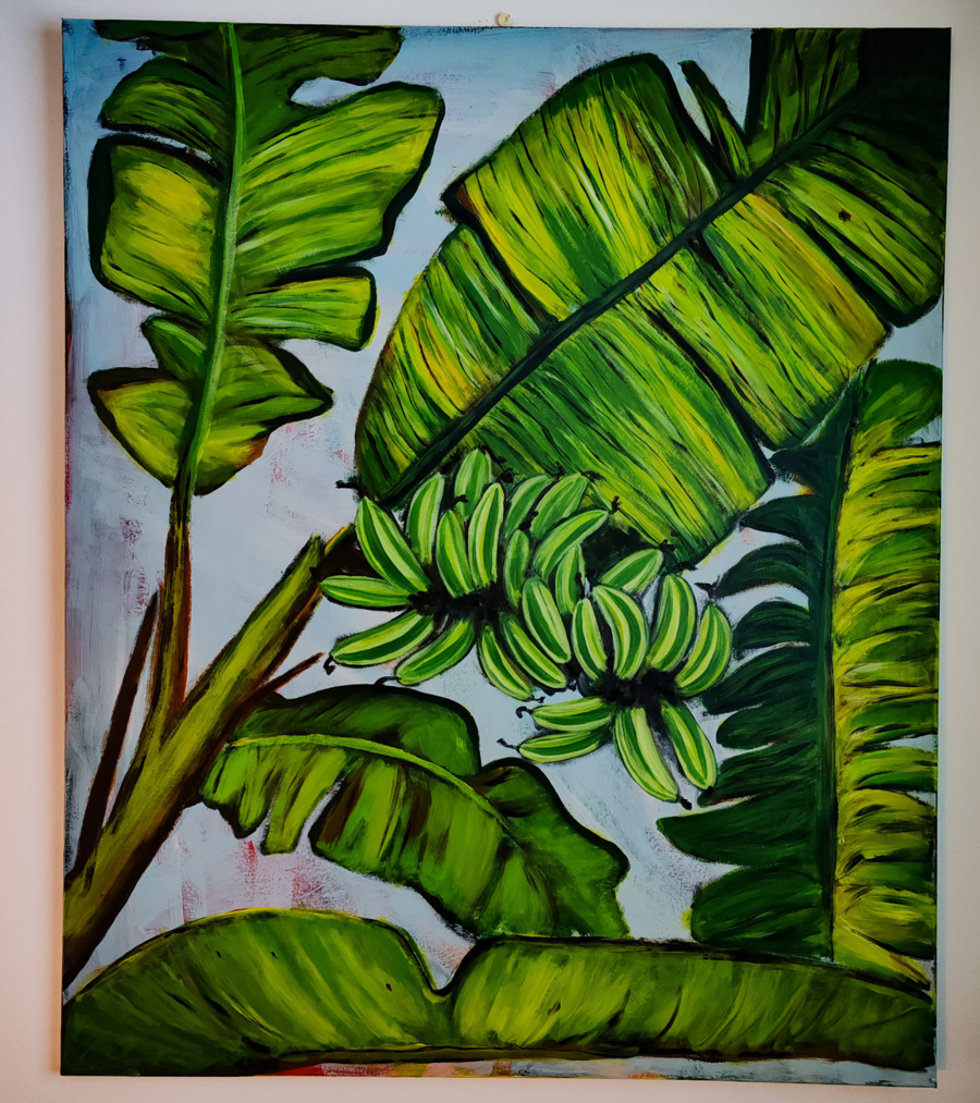 Green leaves on a light blue background