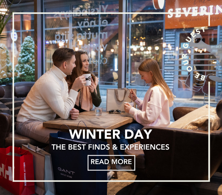 A family taking a break at Espresso House while shopping at the outlet