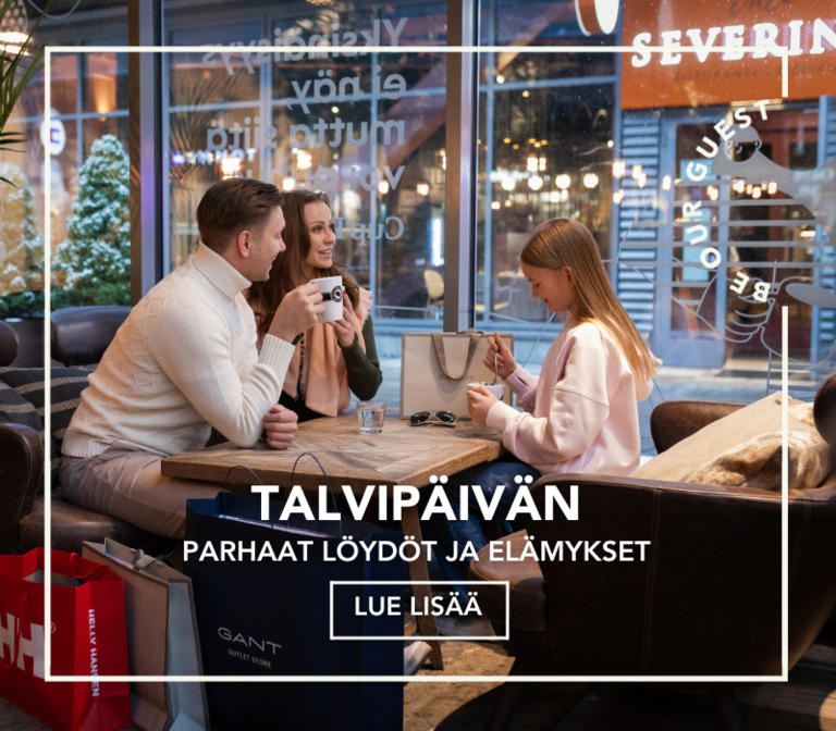 Perhe kahvitauolla Espresso Housessa ostosten lomassa