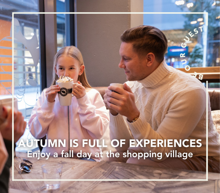 A family is having cups of hot drinks at Espresso House in the shopping village