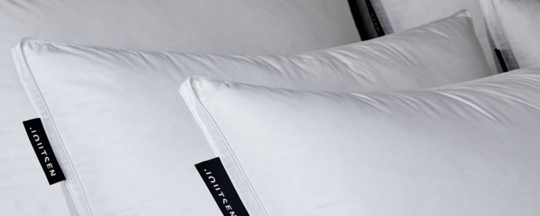 Two white Joutsen pillows