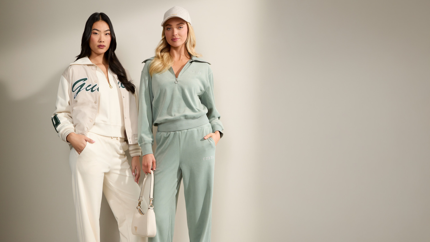 Two bags in brown neutral colours photographed in a studio
