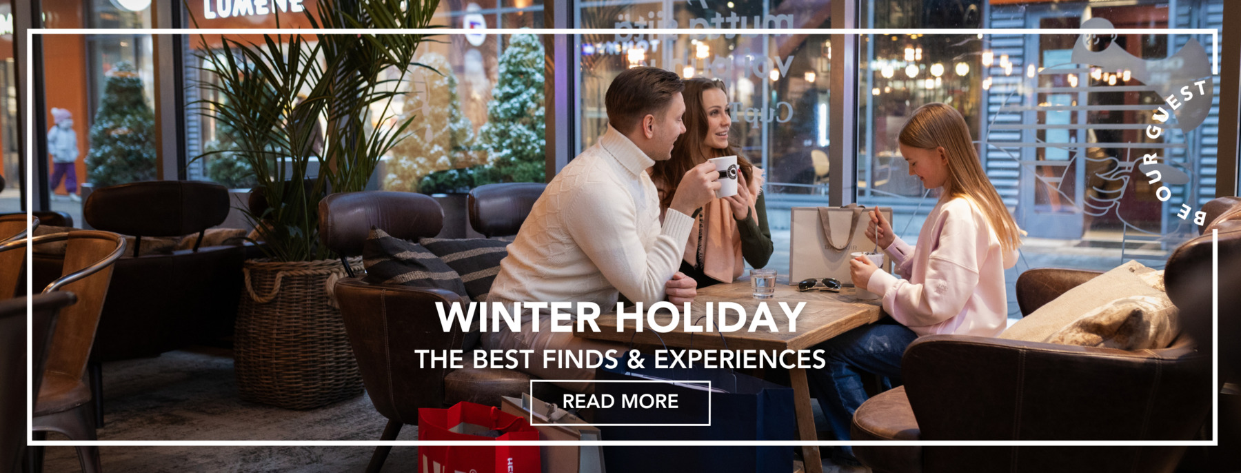 A family taking a break at Espresso House while shopping at the outlet